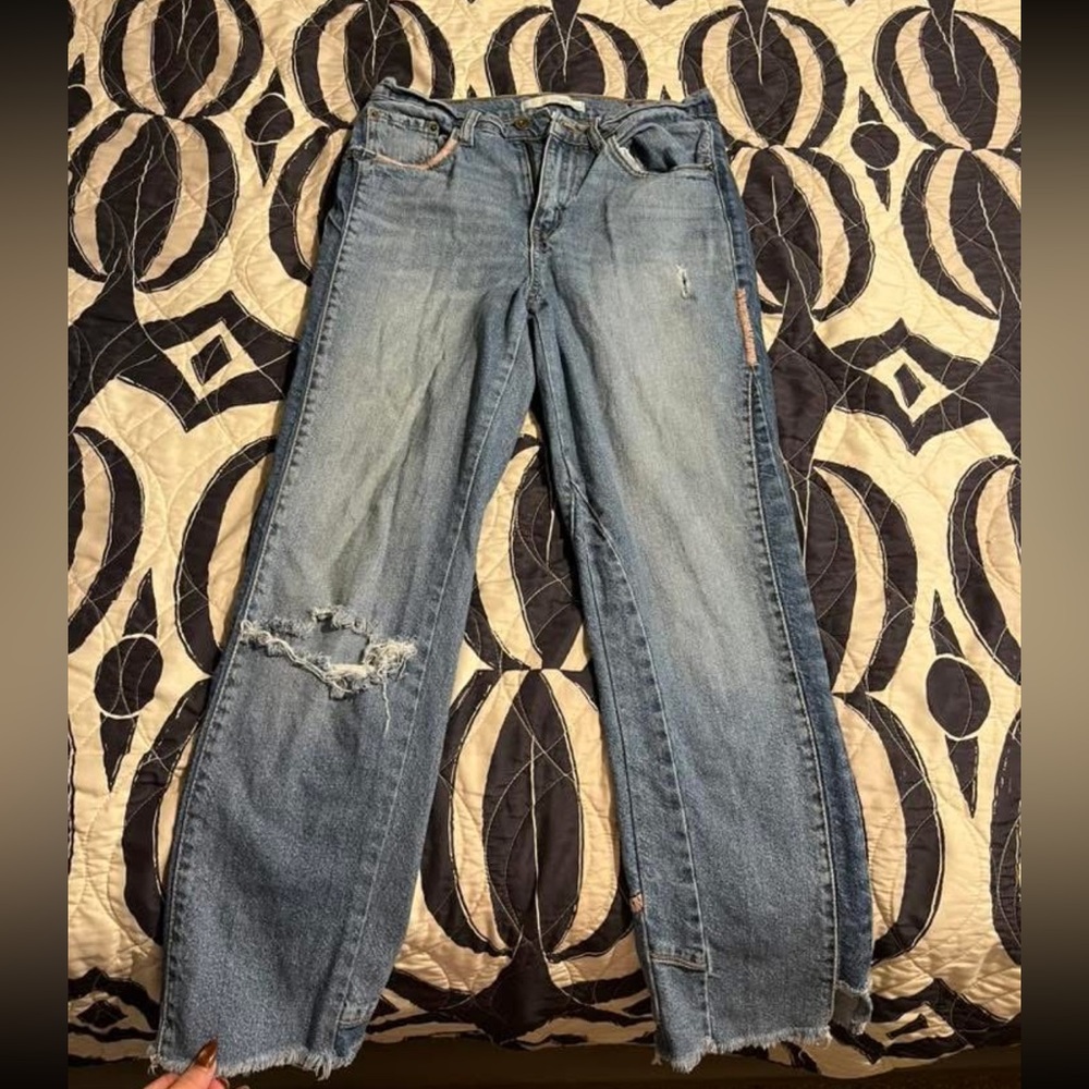 Distressed Blue Jeans